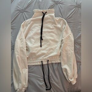 Cozy Cream Sweatshirt with Black Drawstrings